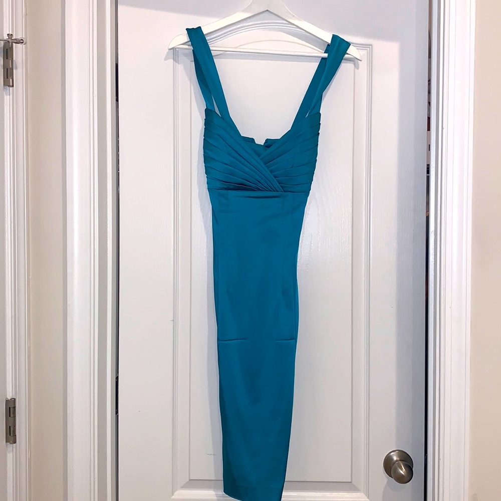 Teal in color! Nice cocktail or wedding guest dress!